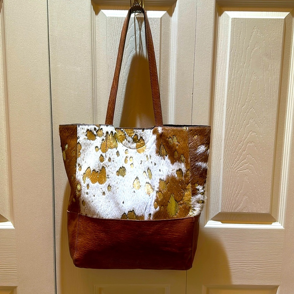 Brave 1992 brown, cream and gold cow hide bag. Like new. Perfect bag